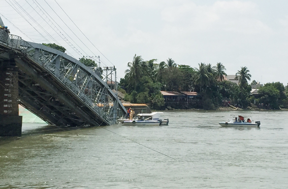 The Ghenh bridge across Dong Nai River collapses.