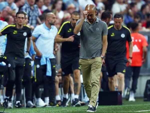 Pep Guardiola thất bại trong ngày trở lại Allianz Arena. (Nguồn: telegraph)