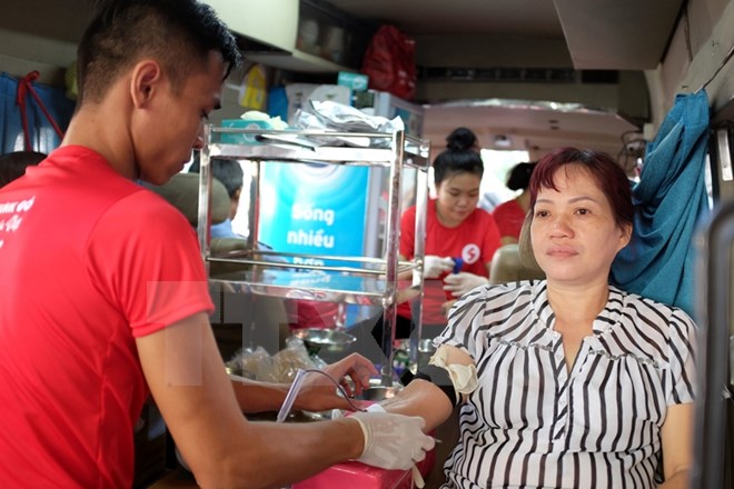    Người dân tại Thành phố Hồ Chí Minh tham gia hiến máu nhân đạo. (Ảnh: Thế Anh/TTXVN)