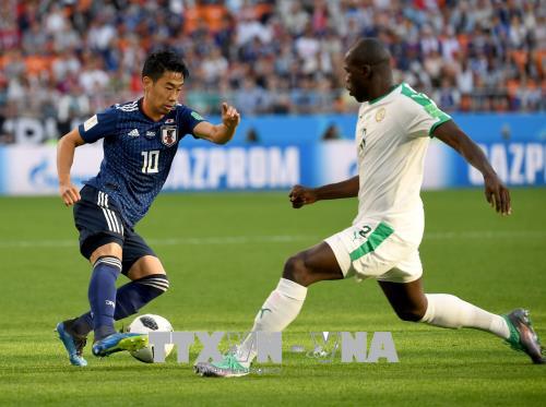 ha tranh bóng giữa cầu thủ Shinji Kagawa (trái) của Nhật Bản và cầu thủ Senegal Kalidou Koulibaly trong lượt trận thứ hai bảng H, vòng chung kết World Cup 2018 ở Yekaterinburg, Nga ngày 24-6. Ảnh: THX/ TTXVN.