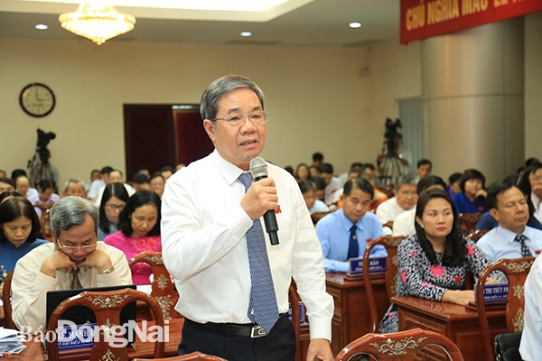 Phó chủ tịch UBND tỉnh Nguyễn Quốc Hùng phát biểu tại buổi thảo luận chiều 9-7. Ảnh: Công Nghĩa
