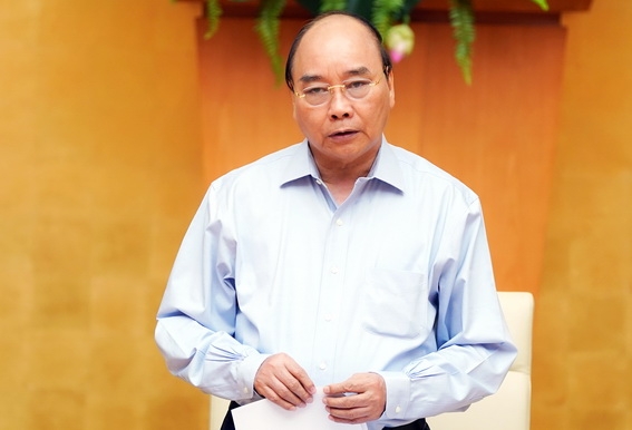 Thủ tướng Nguyễn Xuân Phúc phát biểu kết luận cuộc họp - Ảnh VGP Quang Hiếu