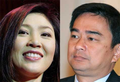 Hai ứng viên nặng ký trong cuộc tổng tuyển cử  - bà Yingluck (trái) và ông Ahbishit