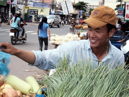 Nụ cười mãn nguyện sau ngày dài lao động vất vả. Ảnh: V.Nguyên