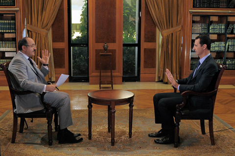 Trong cuộc phỏng vấn, Tổng thống Syria Bashar al-Assad cho rằng hiện vẫn chưa có thời điểm chính thức hoặc các nhân tố nào đạt được thành công cho Hội nghị hòa bình Geneva 2 về Syria. Ảnh: AFP/ TTXVN