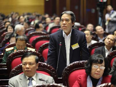 Thống đốc Ngân hàng Nhà nước Việt Nam Nguyễn Văn Bình trả lời chất vấn của đại biểu Quốc hộ