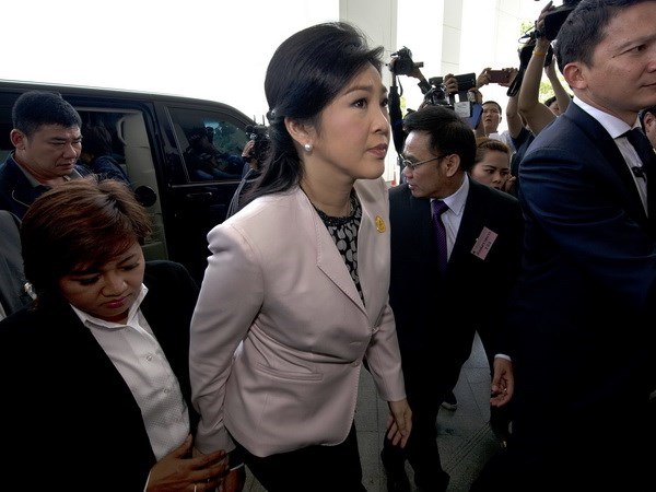 Thủ tướng tạm quyền Yingluck Shinawatra tới Ủy ban chống tham nhũng quốc gia. (Nguồn: AFP/TTXVN)