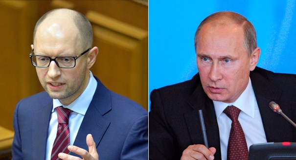 Thủ tướng Ukraine Arseniy Yatsenyuk (trái) không tin tưởng Tổng thống Nga Vladimir Putin. (Nguồn: Getty, AP)