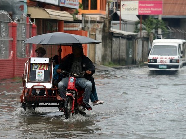 Mưa lớn gây ngập lụt tai Philippines. (Nguồn: Getty Images)