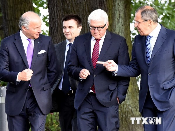 Ngoại trưởng các nước trước cuộc họp tại Berlin, ngày 17/8. (Nguồn: AFP/TTXVN)
