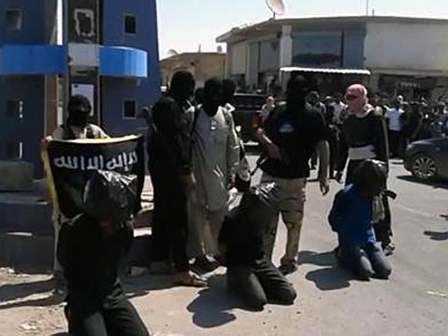 IS tổ chức hành quyết người dân ngay giữa đường phố. Ảnh minh họa. (Nguồn: news.com.au)