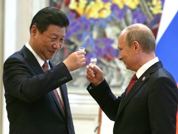 Chủ tịch Trung Quốc Tập Cận Bình (trái) và Tổng thống Nga Putin. (Ảnh: ITAR-TASS)