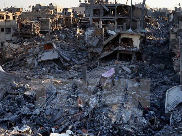 Cảnh đổ nát tại Shejaiya, dải Gaza, sau đợt oanh kích của máy bay Israel tháng 8/2014. (Nguồn: AFP/TTXVN)