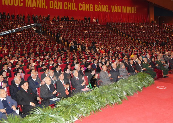 Các đồng chí lãnh đạo, nguyên lãnh đạo Đảng, Nhà nước và các đại biểu tham dự phiên khai mạc Đại hội. (Nguồn: TTXVN)