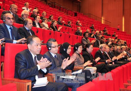 Các đại biểu quốc tế tham dự Lễ bế mạc Đại hội đại biểu toàn quốc lần thứ XII Đảng Cộng sản Việt Nam. (Ảnh: TTXVN)