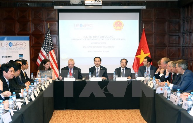 Chủ tịch nước Trần Đại Quang tiếp Liên minh các doanh nghiệp Hoa Kỳ trong APEC. (Ảnh: Nhan Sáng/TTXVN)
