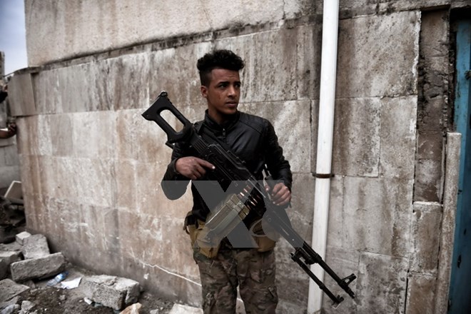 Binh sỹ Iraq trong chiến dịch giải phóng phía tây thành phố Mosul ngày 11/3. (Nguồn: AFP/TTXVN)