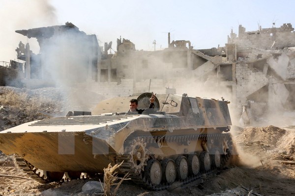 Lực lượng Chính phủ Syria tiến vào thị trấn Qabun ngày 13/5. (Nguồn: AFP/TTXVN)
