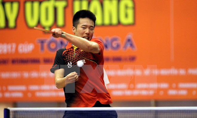Trận chung kết đơn Nam giữa tay vợt Kang Dong Soo (Hàn Quốc) với tay vợt Park Chan Hyeok (Hàn Quốc). (Ảnh: Mạnh Linh/TTXVN)