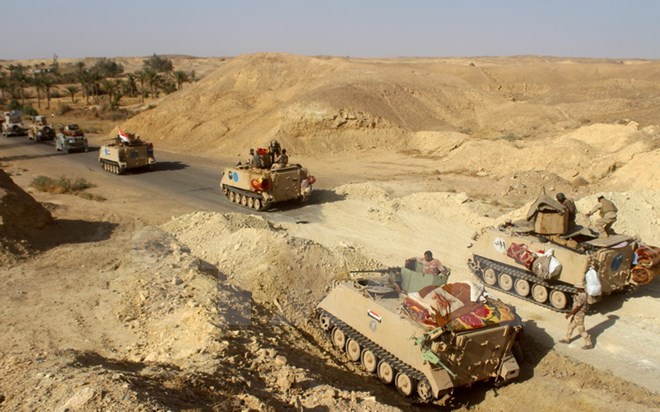 Các lực lượng Iraq trong chiến dịch chống IS tại tỉnh Anbar. (Nguồn: AFP/TTXVN)