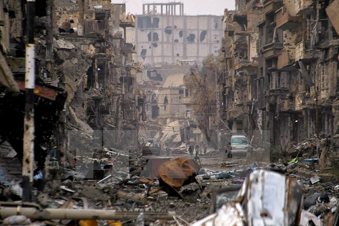 Cảnh đổ nát tại Deir al-Zor, Syria sau các cuộc không kích. (Nguồn: Reuters/TTXVN)