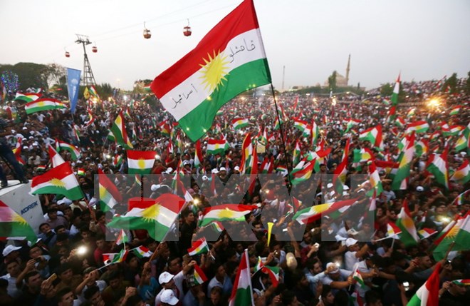Cộng đồng người Kurd ở Iraq tham gia cuộc tuần hành kêu gọi người dân tham gia cuộc trưng cầu dân ý sắp tới tại thủ phủ Arbil ngày 16/9. (Nguồn: AFP/TTXVN)