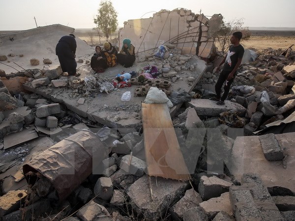 Cảnh đổ nát sau các cuộc giao tranh tại Barzan, tỉnh Nineveh, Iraq. (Nguồn: AFP/TTXVN)