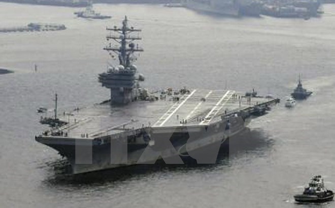 Tàu sân bay USS Ronald Reagan rời căn cứ hải quân Yokosuka gần Tokyo (Nhật Bản) ngày 8/10. (Nguồn: Kyodo/TTXVN)