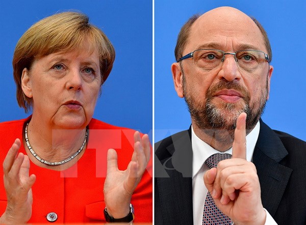 Thủ tướng Đức, người đứng đầu Liên đảng bảo thủ Liên minh Dân chủ/Xã hội Cơ đốc giáo (CDU/CSU), bà Angela Merkel (trái) và lãnh đạo đảng Dân chủ Xã hội (SPD) Martin Schulz. (Nguồn: AFP/TTXVN)