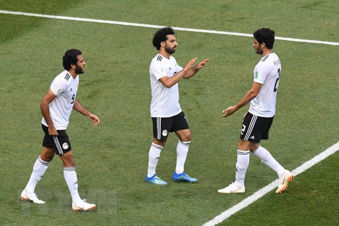  Salah (giữa) lại lập công nhưng Ai Cập vẫn không thắng. (Nguồn: AFP/TTXVN)