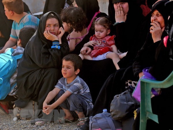 Người dân Syria. (Nguồn: AFP/TTXVN)