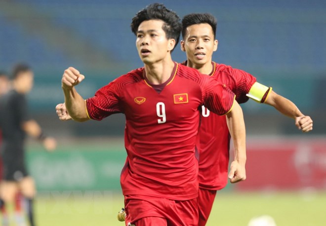 Công Phượng (số 9) ăn mừng bằng thắng ở phút 89 trong trận Olympic Việt Nam gặp Olympic Bahrain tại ASIAD 2018. (Ảnh: Hoàng Linh/TTXVN)