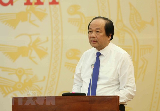 Ông Mai Tiến Dũng, Bộ trưởng, Chủ nhiệm Văn phòng Chính phủ, người phát ngôn Chính phủ phát biểu tại buổi họp báo. (Ảnh: Dương Giang/TTXVN)