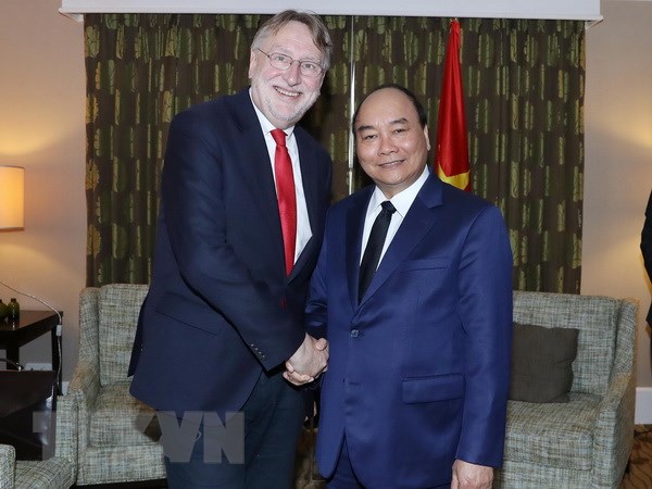 Thủ tướng Nguyễn Xuân Phúc tiếp Chủ tịch Ủy ban Thương mại quốc tế Nghị viện châu Âu Bernd Lange. (Ảnh: Thống Nhất/TTXVN)
