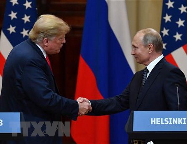 Tổng thống Mỹ Donald Trump (trái) và Tổng thống Nga Vladimir Putin tại hội nghị thượng đỉnh ở Helsinki, Phần Lan ngày 16-7-2018. (Ảnh: AFP/TTXVN)