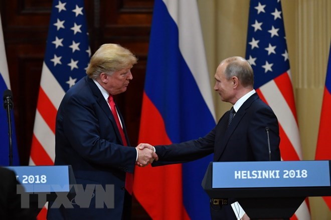 Tổng thống Mỹ Donald Trump (trái) và Tổng thống Nga Vladimir Putin trong cuộc họp báo chung kết thúc Hội nghị thượng đỉnh ở Helsinki, Phần Lan ngày 16-7. (Nguồn: AFP/TTXVN)