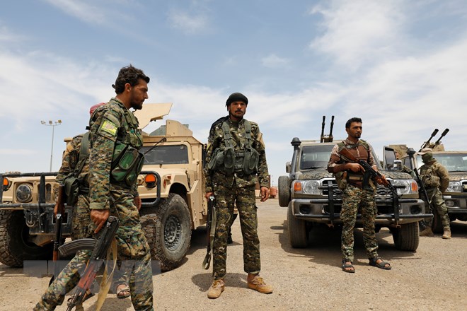 Ảnh tư liệu: Các thành viên SDF trong chiến dịch chống IS gần Abu Kamal, tỉnh Deir Ezzor, miền đông Syria ngày 1-5-2018. (Nguồn: AFP/TTXVN)