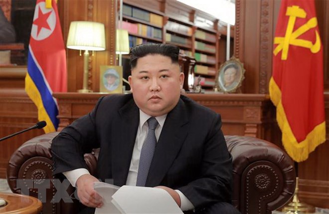 Nhà lãnh đạo Triều Tiên Kim Jong-un phát biểu nhân dịp Năm mới 2019 tại một địa điểm không xác định ngày 1-1-2019. (Ảnh: AFP/TTXVN)