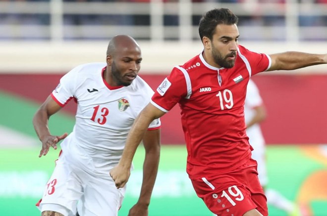 Jordan (áo trắng) vượt qua Syria để giành vé vào vòng 1/8 Asian Cup 2019. (Nguồn: AFC)