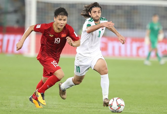 Tiền vệ Quang Hải đi bóng trong trận đấu với đội tuyển Iraq. (Ảnh: Hoàng Linh/TTXVN)