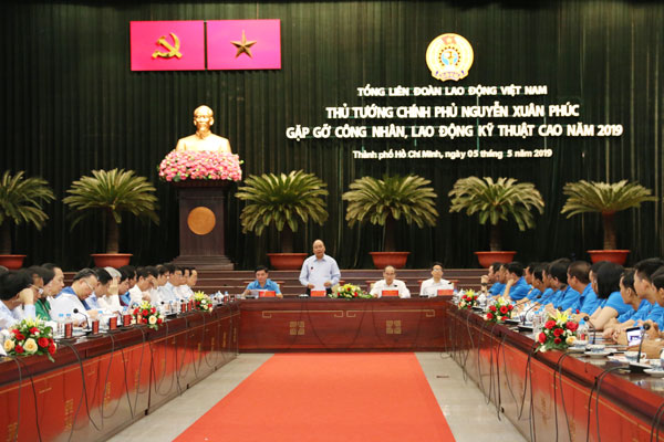 Thủ tướng Chính phủ Nguyễn Xuân Phúc phát biểu tại buổi gặp gỡ công nhân, lao động kỹ thuật cao vào ngày 5-5 ở TP.Hồ Chí Minh. Ảnh: Hạnh Dung
