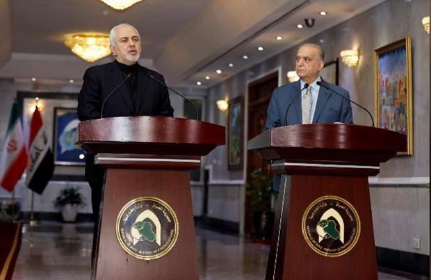 Ngoại trưởng Iraq Mohammed al-Hakim và người đồng cấp Iran Mohammad Javad Zarif. (Nguồn: Reuters)