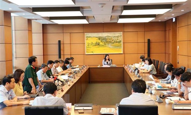  Đại biểu Quốc hội tỉnh Phú Yên, Bắc Ninh, An Giang, Bạc Liêu thảo luận tại tổ. (Ảnh: Văn Điệp/TTXVN)