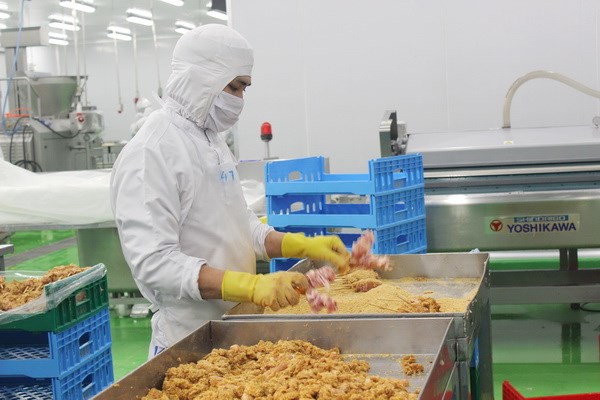 Worker at the FDI-invested Koyu-Unitex company in Bien Hoa city of Dong Nai province (Photo: www.baodongnai.com.vn)