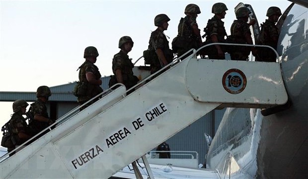 Binh sỹ Chile đáp máy bay tới Haiti tham gia lực lượng đa quốc gia hỗ trợ quốc gia vùng Caribe. Ảnh minh họa.(Nguồn: AFP/TTXVN)