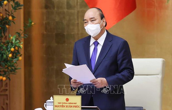 Thủ tướng Nguyễn Xuân Phúc chủ trì cuộc họp Thường trực Chính phủ với Ban Chỉ đạo quốc gia phòng chống dịch COVID-19 vào chiều 15-2 (mùng 4 Tết). Ảnh:TTXVN