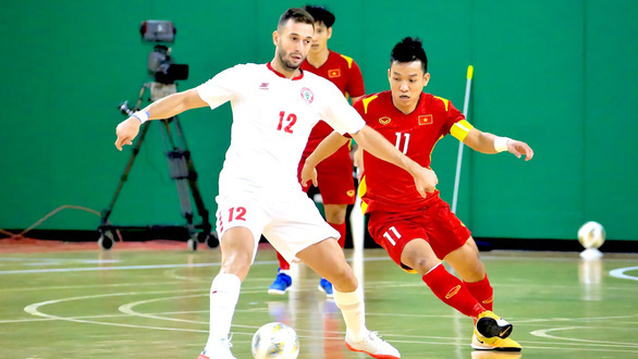 Đội tuyển futsal Việt Nam (áo đỏ) lần thứ hai làm nên lịch sử khi được tham dự World Cup - Ảnh: AFC