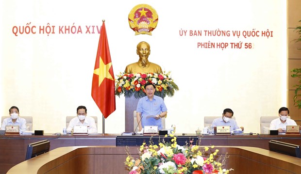 Chairman of the National Assembly Vuong Dinh Hue (centre) speaks at the 56th meeting of the NA Standing Committee on May 27.