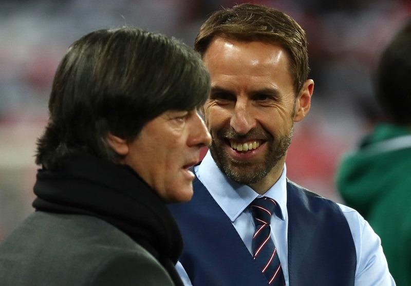 Hai HLV Gareth Southgate (phải) và Joachim Loew sẽ có cuộc đối đầu thú vị. Ảnh: DPA