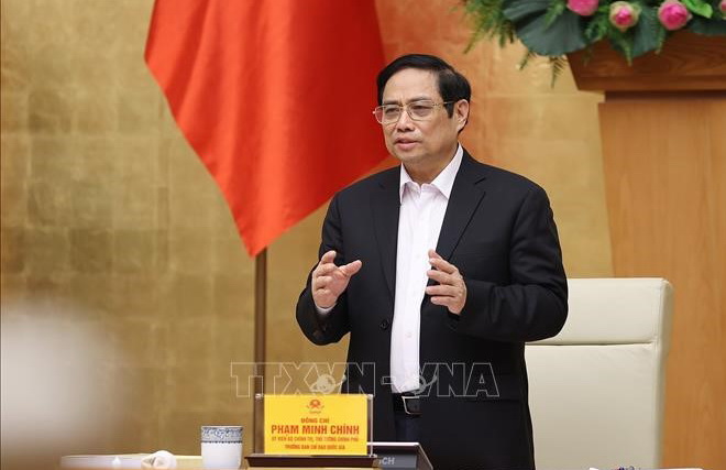 Thủ tướng Phạm Minh Chính chủ trì sơ kết công tác phòng, chống dịch COVID-19 trong đợt bùng phát lần thứ 4. Ảnh Dương Giang TTXVN
